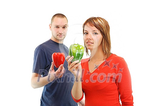 happy couple with pepper vegetable isolated happy couple with pepper vegetable isolated