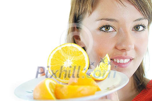 pretty woman with orange fruit