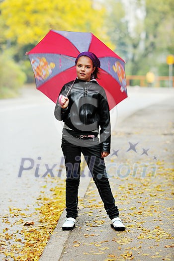 happy girl with umbrella outdoor in park on autumn season rain day happy girl with umbrella outdoor in park on autumn season rain day