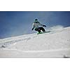 snowboard woman racing downhill slope and freeride on powder snow at winter season and sunny day