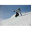 snowboard woman racing downhill slope and freeride on powder snow at winter season and sunny day