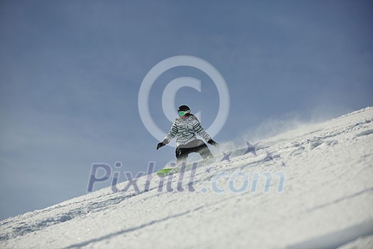 snowboard woman racing downhill slope and freeride on powder snow at winter season and sunny day snowboard woman racing downhill slope and freeride on powder snow at winter season and sunny day