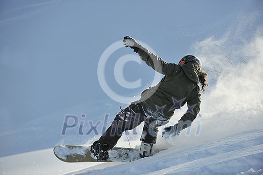 freestyle snowboarder jump and ride free style at sunny winter day on mountain freestyle snowboarder jump and ride free style at sunny winter day on mountain