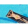 beautiful young woman relax and have fun at swimming pool