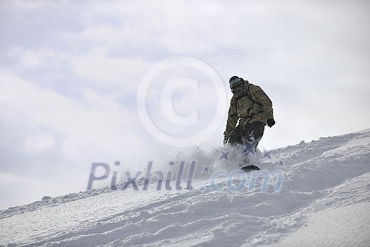 freestyle snowboarder jump and ride free style at sunny winter day on mountain freestyle snowboarder jump and ride free style at sunny winter day on mountain