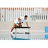 young healthy athlete man exercise at poolside