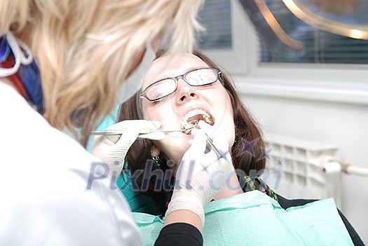 girl on dentist chair girl on dentist chair