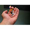 pills in human hand
