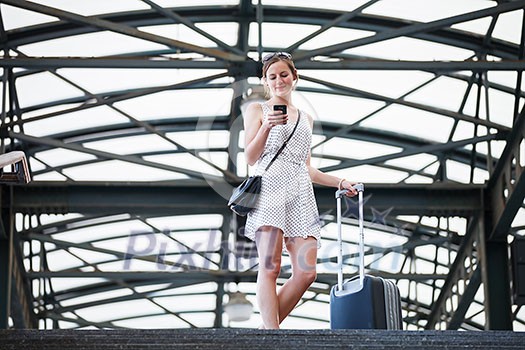 Pretty young woman at a train station Pretty young woman at a train station