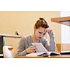 pretty female college student in a llibrary (color toned image)