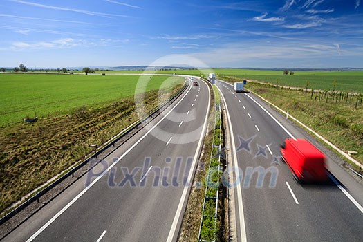 highway traffic on a lovely, sunny summer day highway traffic on a lovely, sunny summer day