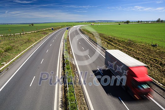 highway traffic on a lovely, sunny summer day highway traffic on a lovely, sunny summer day
