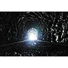 light on end of train tunnel representing new life and success concept