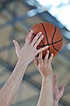 competition cencept with people who playing basketball in school gym