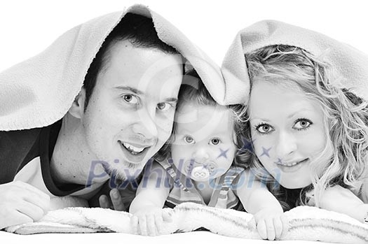 young happy family with beautiful baby playing and smile isolated on white in studio young happy family with beautiful baby playing and smile isolated on white in studio