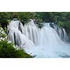 beautiful nature scene with river and waterfall at spring seasson