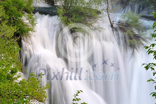 beautiful nature scene with river and waterfall at spring seasson beautiful nature scene with river and waterfall at spring seasson