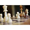 chess figures arranged on chess table closeup