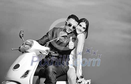 wedding sce of bride and groom just married couple on the beach ride white scooter and have fun wedding sce of bride and groom just married couple on the beach ride white scooter and have fun