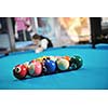 young pro billiard player finding best solution and right angle at billard or snooker pool sport  game 