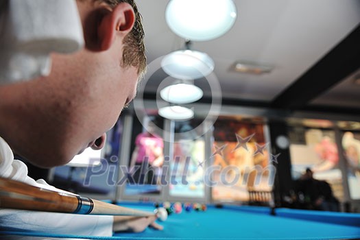 young pro billiard player finding best solution and right angle at billard or snooker pool sport game young pro billiard player finding best solution and right angle at billard or snooker pool sport game