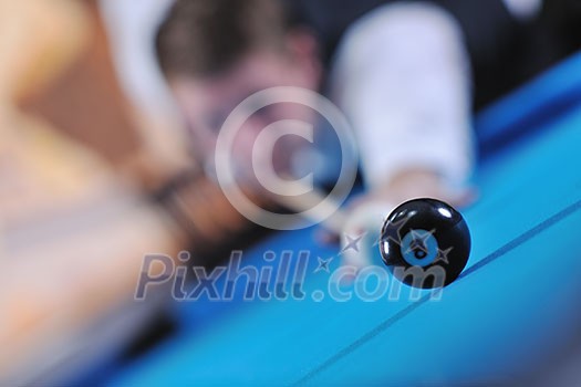 young pro billiard player finding best solution and right angle at billard or snooker pool sport game young pro billiard player finding best solution and right angle at billard or snooker pool sport game