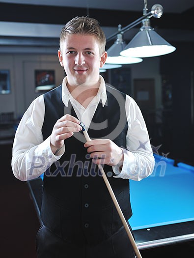 young pro billiard player finding best solution and right angle at billard or snooker pool sport game young pro billiard player finding best solution and right angle at billard or snooker pool sport game
