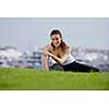 Young beautiful  woman jogging and running  on morning at  park in the city. Woman in sport outdoors health and fitness concept