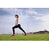 Young beautiful  woman jogging and running  on morning at  park in the city. Woman in sport outdoors health and fitness concept