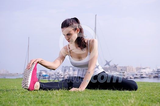 Young beautiful woman jogging and running on morning at park in the city. Woman in sport outdoors health and fitness concept Young beautiful woman jogging and running on morning at park in the city. Woman in sport outdoors health and fitness concept