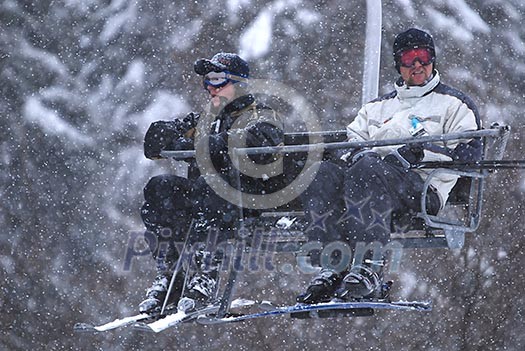 on a chair lift on a chair lift