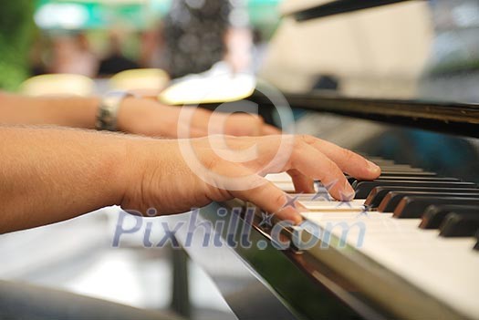 Man playing melody on piano Man playing melody on piano