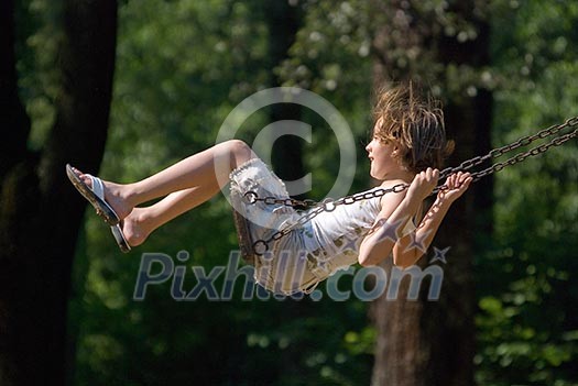 happy girl swinging (NIKON D80; 10.6.2007; 1/1000 at f/6.3; ISO 400; white balance: Auto; focal length: 270 mm) happy girl swinging (NIKON D80; 10.6.2007; 1/1000 at f/6.3; ISO 400; white balance: Auto; focal length: 270 mm)