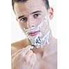 young handsome man have shaving isolated on white 