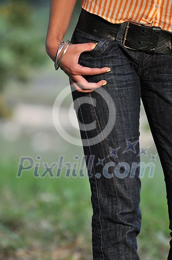 woman torso jeans leg stomach outdoor woman torso jeans leg stomach outdoor