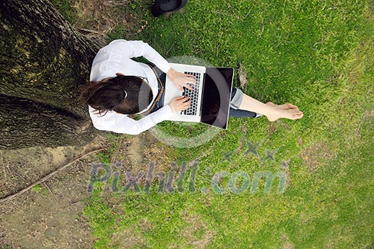 happy young student woman with laptop in city park study happy young student woman with laptop in city park study