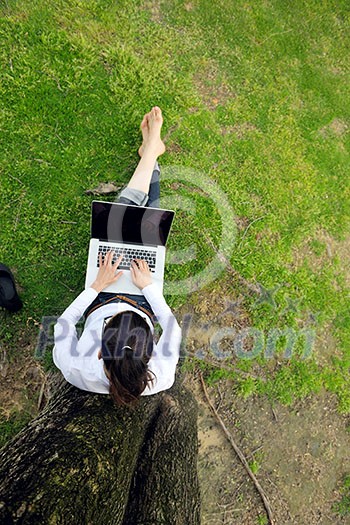 happy young student woman with laptop in city park study happy young student woman with laptop in city park study