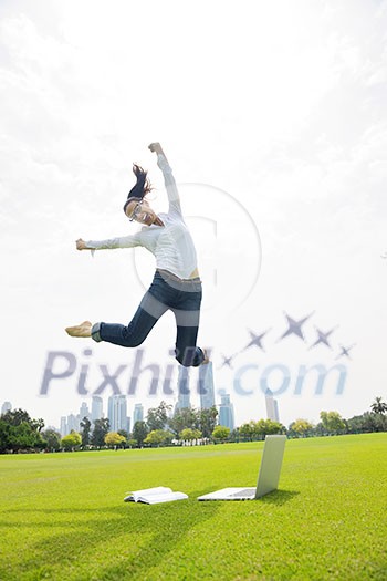 happy young student woman with laptop in city park study happy young student woman with laptop in city park study