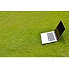 laptop comuter on grass, freedom communication concetp and education and study