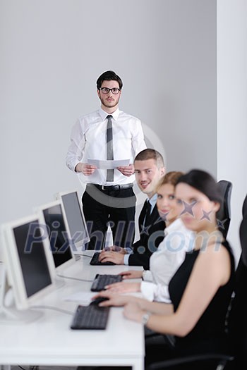 business people group with headphones giving support in help desk office to customers, manager giving training and education instructions business people group with headphones giving support in help desk office to customers, manager giving training and education instructions