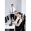 business people group with  headphones giving support in  help desk office to customers, manager giving training and education instructions