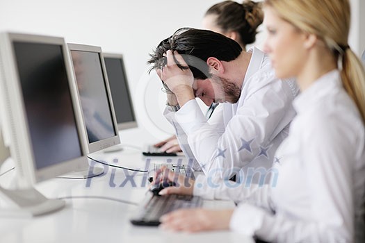 Portrait of a young business man looking depressed and worried from work at meeting office indors Portrait of a young business man looking depressed and worried from work at meeting office indors
