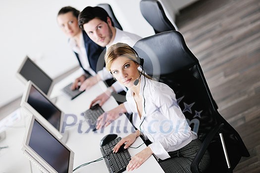 business people group with headphones giving support in help desk office to customers, manager giving training and education instructions business people group with headphones giving support in help desk office to customers, manager giving training and education instructions
