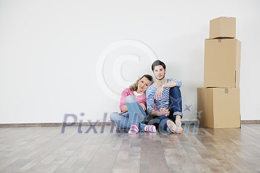 happy Young couple moving in new house happy Young couple moving in new house