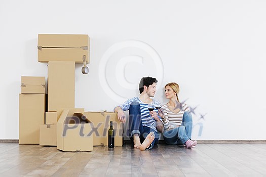 happy Young couple moving in new house happy Young couple moving in new house