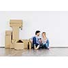 happy Young couple moving in new house