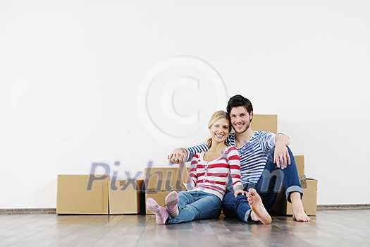happy Young couple moving in new house happy Young couple moving in new house