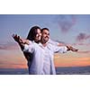 happy young romantic couple in love have fun on beautiful beach at beautiful summer day