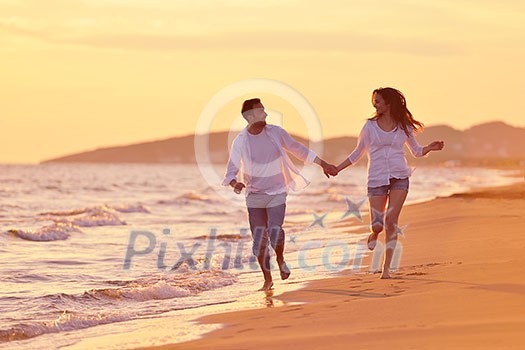 happy young romantic couple in love have fun on beautiful beach at beautiful summer day happy young romantic couple in love have fun on beautiful beach at beautiful summer day