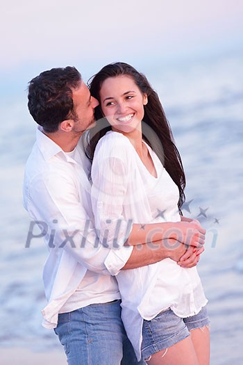 happy young romantic couple in love have fun on beautiful beach at beautiful summer day happy young romantic couple in love have fun on beautiful beach at beautiful summer day